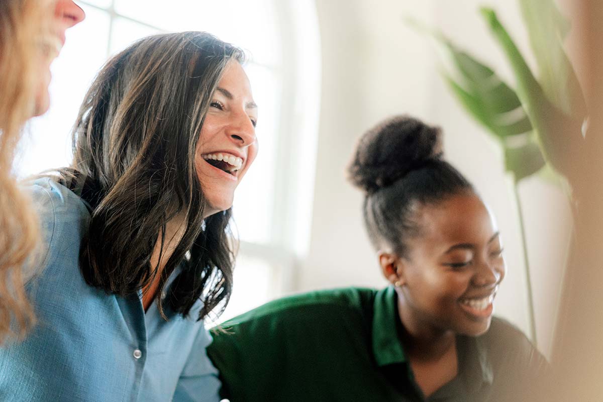 Addiction Treatment Center in Dallas clients laughing in an addiction treatment center in dallas