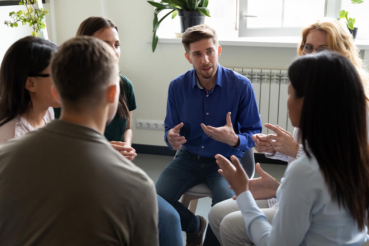 group talking about outpatient rehab in lewisville texas