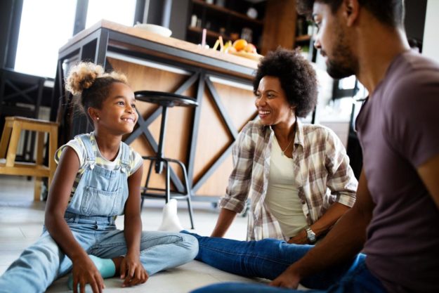 How Family Can Be Impacted by Addiction parents and child learning about family and addiction