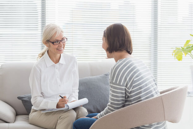 Does EMDR Help with Anxiety Therapist talks to client about EMDR therapy for anxiety