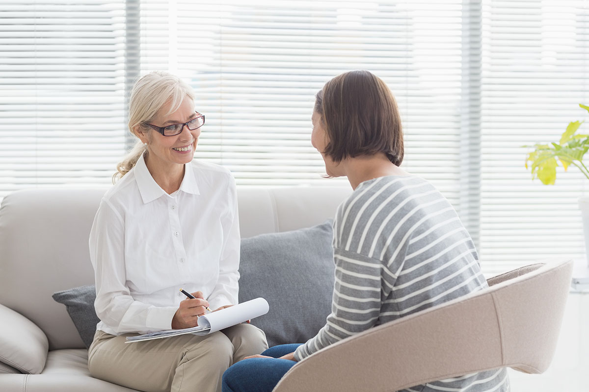 Does EMDR Help with Anxiety Therapist talks to client about EMDR therapy for anxiety
