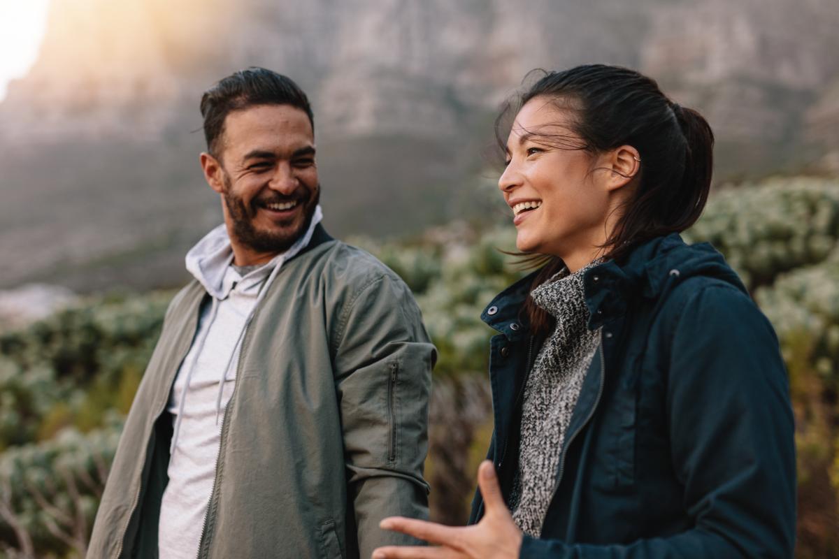 The Importance of Boundaries in a Healthy Relationship Couple talks while going for a hike, after learning the importance of boundaries in a healthy relationship
