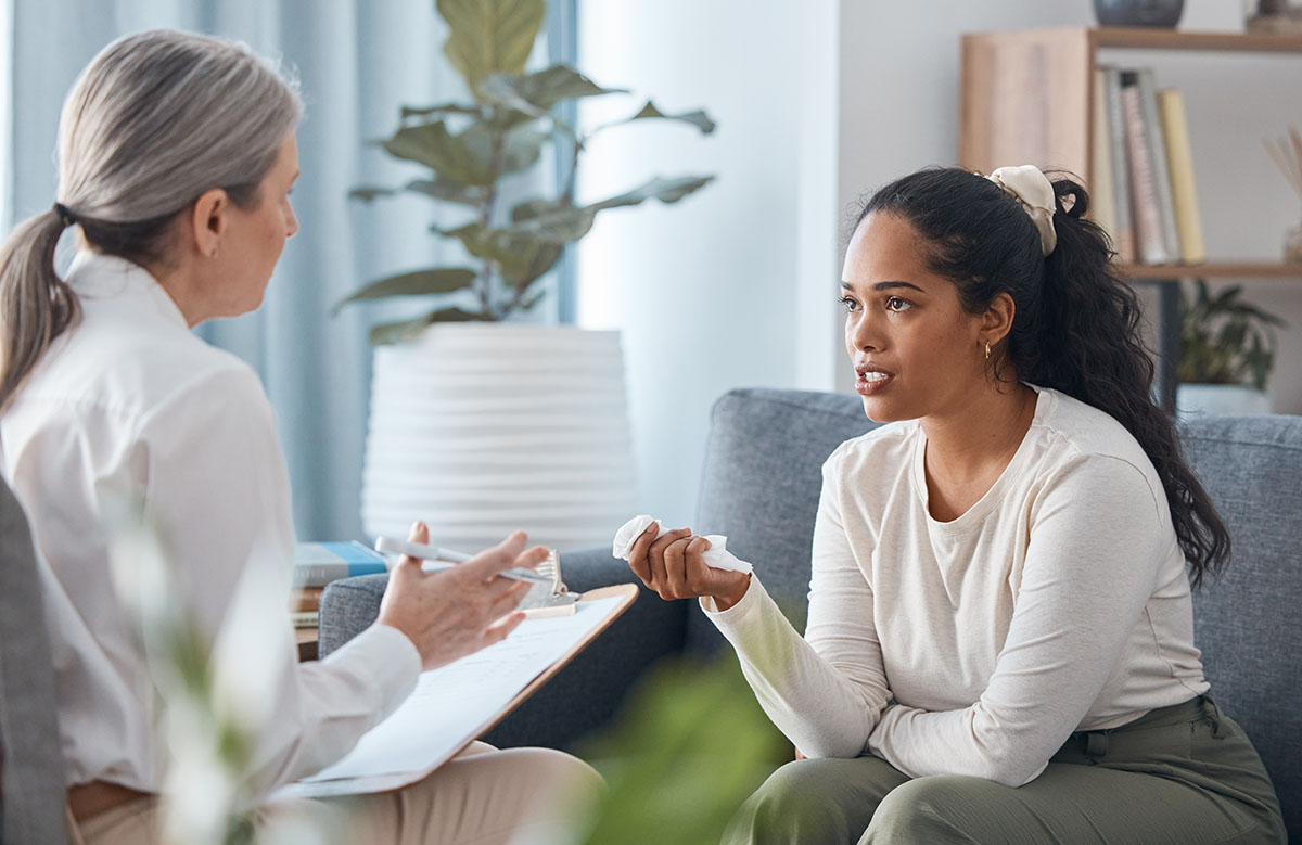 Getting Treatment for Emotional Eating Woman talks to therapist about emotional eating